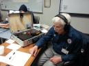 Dan Howard, K1DYO, operates from the Barnstable County Mutual Aid Coordination Center on Cape Cod during the blizzard. [Rob Macedo, KD1CY, photo]