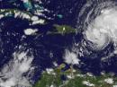 Tropical Storm Irene, as seen by NASA's GOES-13 satellite over Puerto Rico on Sunday, August 21. [Image courtesy of NASA]