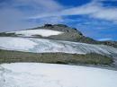 Only a few meters left to the summit of Galdhoepiggen, 2469 masl, Norway's highest mountain.