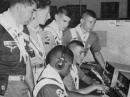 During the 1964 Jamboree on the Air, a group of Scouts and Explorers of the Atlantic City, New Jersey area watching John Gronlund as he operates K2BFW.